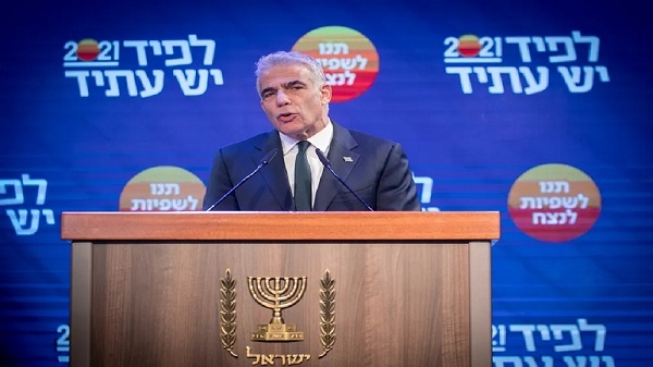وزير الخارجية الإسرائيلي يتحدث إلى ماكرون حول المفاوضات النووية الإيرانية